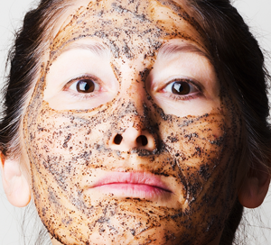 Care for Your Skin with All-Natural Scrubs and Masks Woman with Natural Face Mask